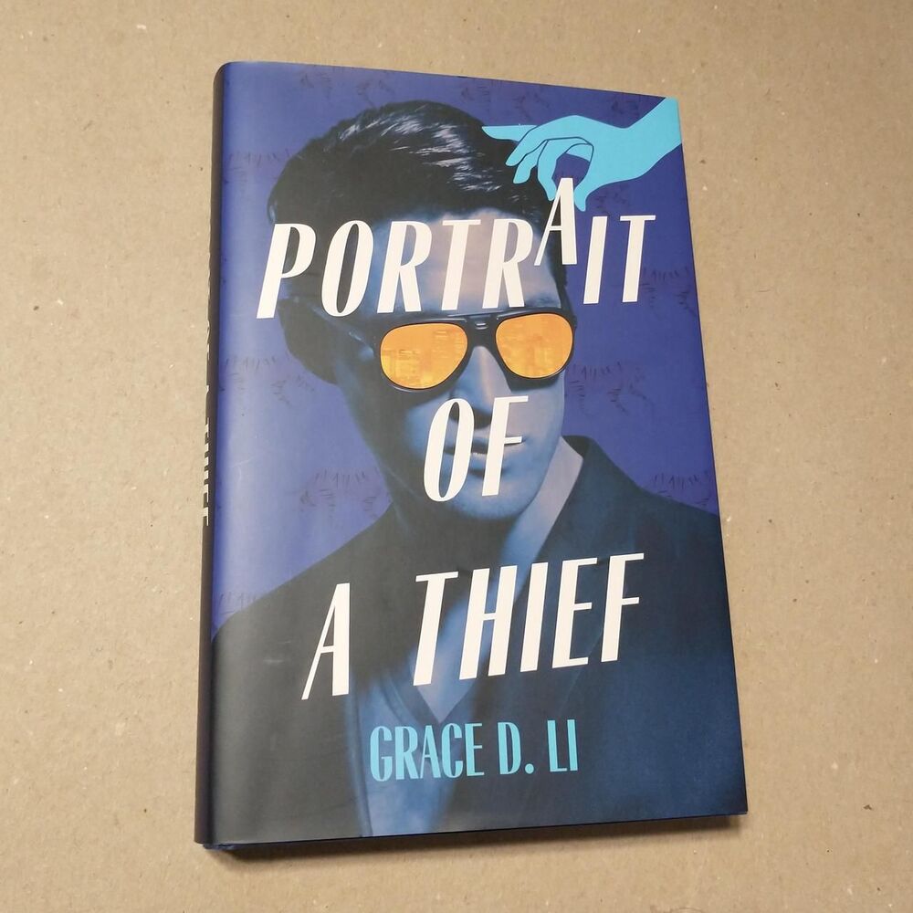 Portrait Of A Thief by Grace D. Li.  Signed Illumicrate